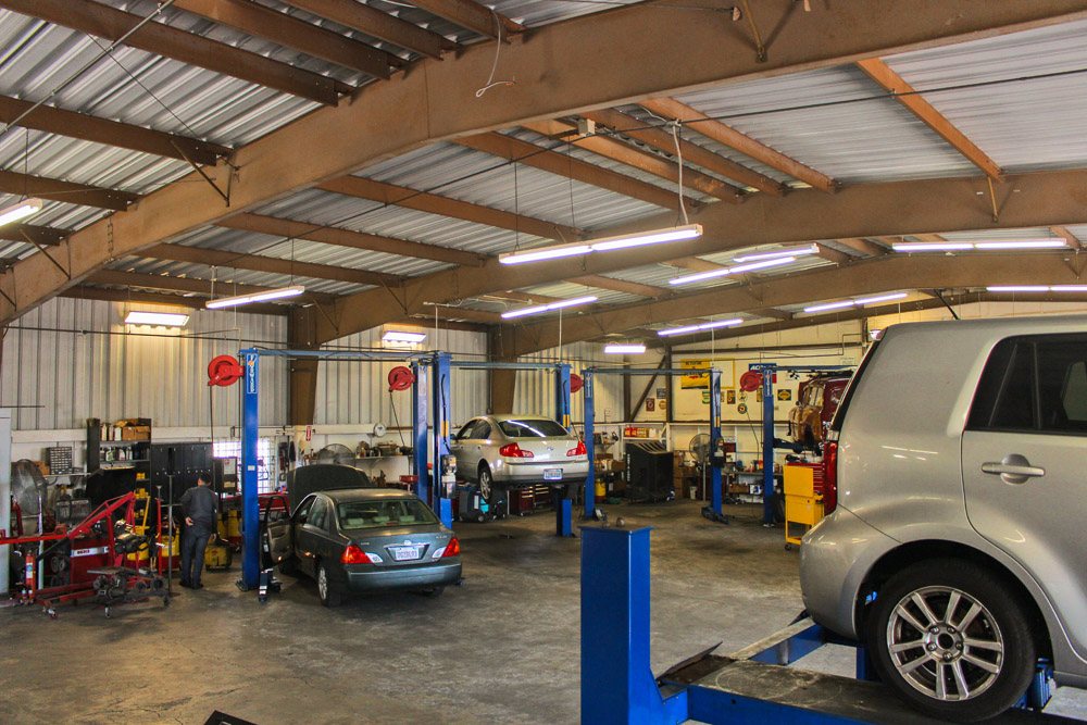 Service bays under the wood-beam roof